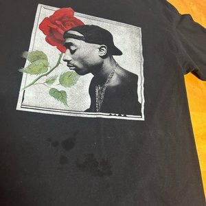 Tupac shirt. Does have stains from washer some how